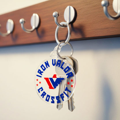 Keychain with Iron Valor CrossFit logo hanging on a wooden hook rack.